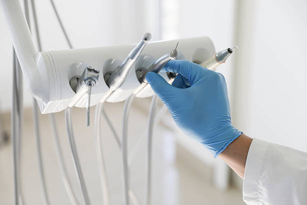 Professional Tooth Extraction technician working in Tye, TX